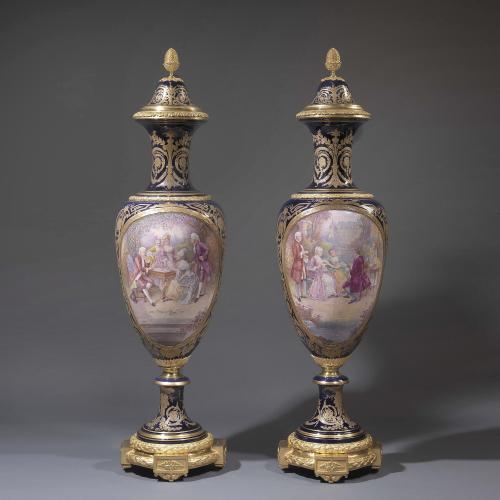 An Exceptional Pair of Sèvres Style Porcelain Vases and Covers