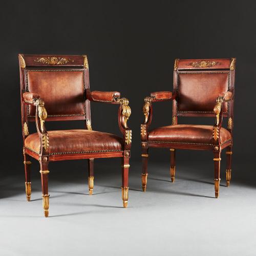 A Pair of Carved and Gilded Armchairs attributed to Maison Jansen