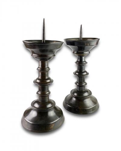 Large pair of patinated brass pricket candlesticks. German, early 16th century