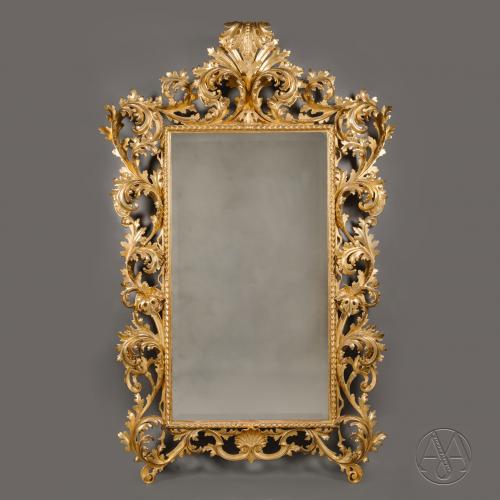 A Large and Elaborately Carved Florentine Giltwood Mirror Dating From Circa 1880
