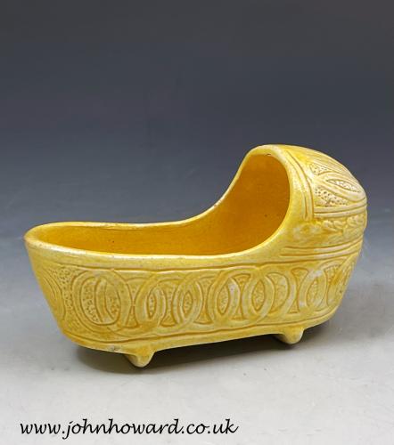 Canary yellow pottery of a cradle Staffordshire circa 1815 period