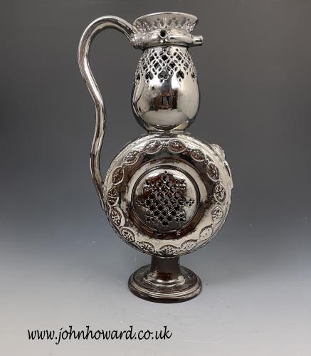 Silver luster pottery puzzle jug with reticulated decoration Yorkshire early 19th century