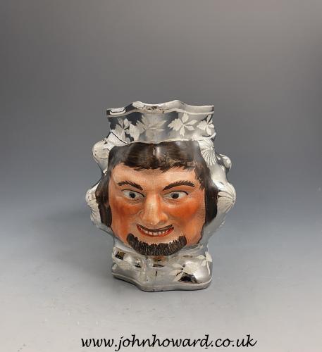 English pottery pitcher with silver lustre and face of a Bacchus early 19th century