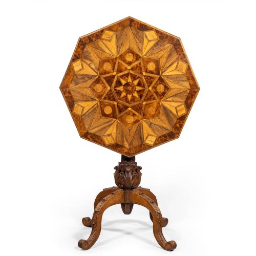 An octagonal indigenous specimen wood marquetry table