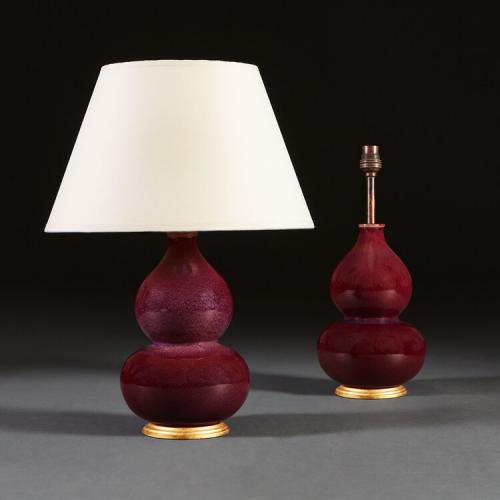 A Pair of Double Gourd Sang de Boeuf Lamps