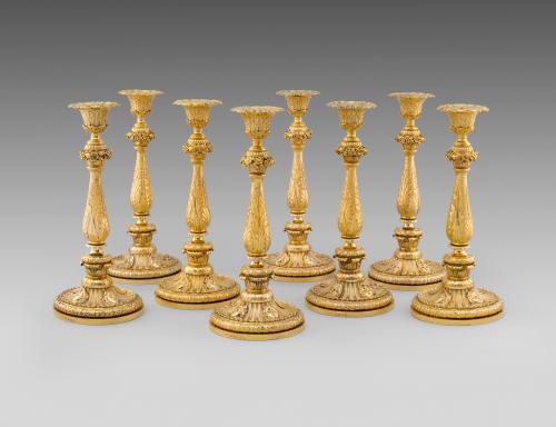 A set of Eight Regency Candlesticks