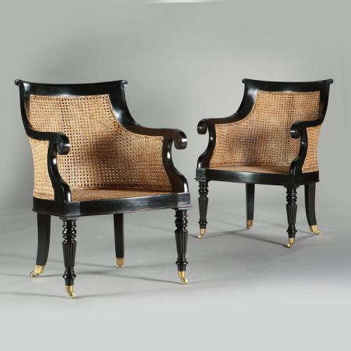 A Pair of Anglo Indian William IV Style Ebony Library Chairs