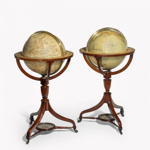A fine pair of 15 inch floor globes by J & G Cary, dated 1820 and 1833
