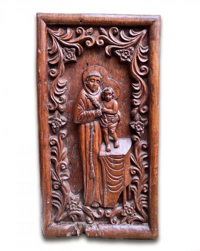Hardwood relief with Saint Anthony and the Christ Child. Goa, 18th century