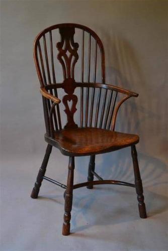A late 18th century yew wood Windsor chair