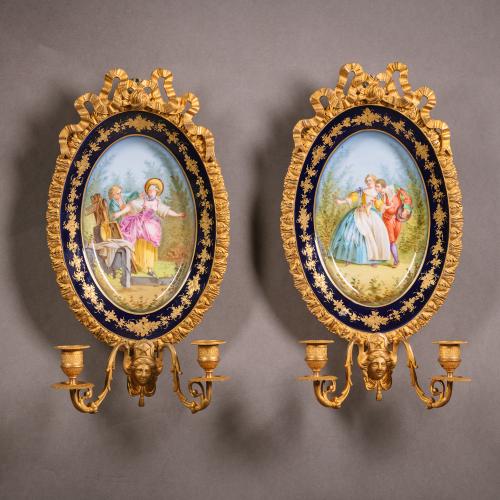 A Pair of Sevres Style Oval Porcelain Dishes Mounted as Appliques