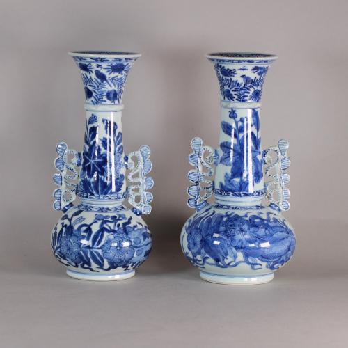 front of vases