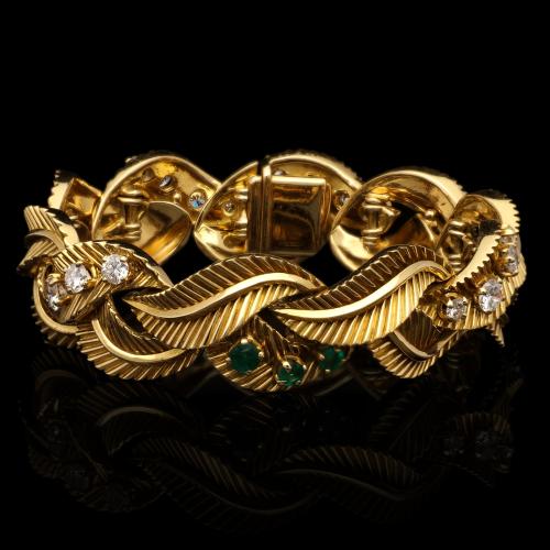 Van Cleef & Arpels Textured Gold Stylised Leaf Bracelet Embellished With Emeralds And Diamonds