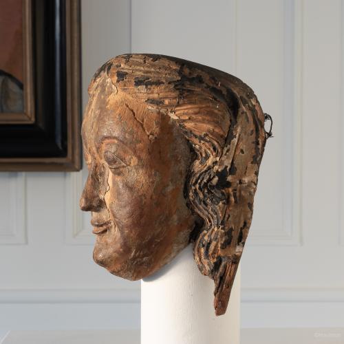 A polychromed limewood female head, South German, circa 1500