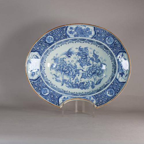Front image of blue and white barber's bowl