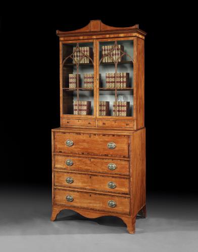 A George III satinwood secretaire bookcase