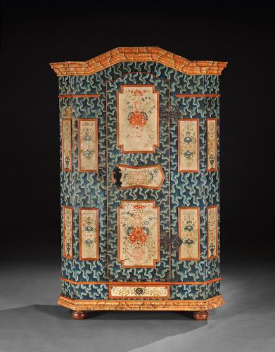 A Fine Paint Decorated Folk Art Marriage Cupboard With Traditional "Jigsaw" Field and Floral Motifs to the Panels