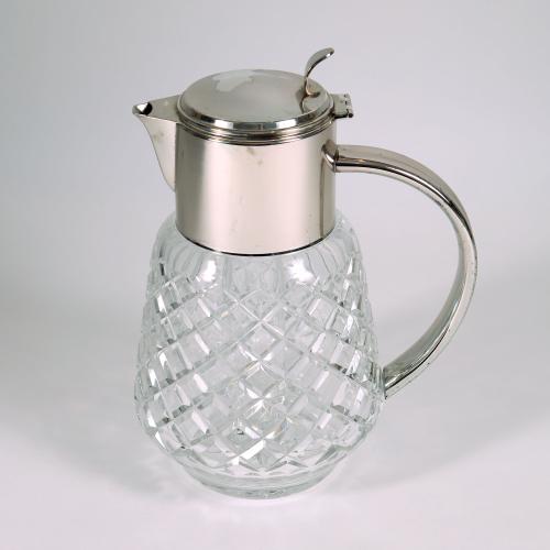 silver plated and cut glass serving jug