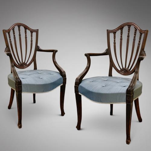 George III mahogany open armchairs