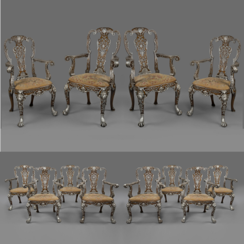 A Rare Set Of Twelve George I Style Carved and Part-Silvered Walnut Dining Chairs by Lenygon & Morant.  English, Circa 1920. 