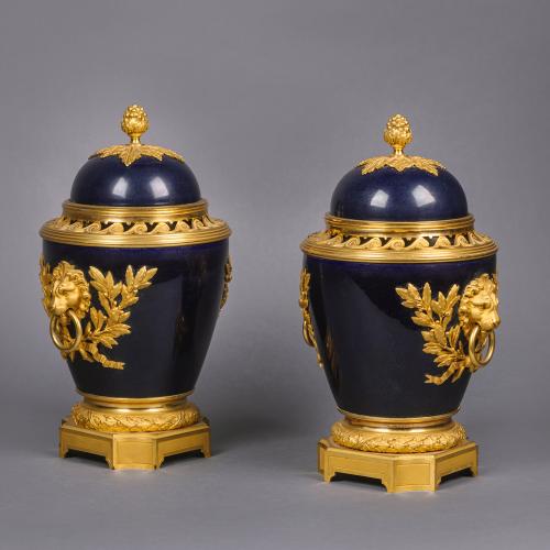 A Pair of Louis XVI Style Gilt-Bronze Mounted Cobalt Blue Ground Porcelain Brûle-Parfum Vases, By Henry Dasson.  French, dated 1887. 