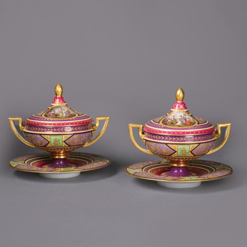 A Pair of Vienna Style Porcelain 'Ecuelles' (Soup Tureens with Covers, on Plates), Austria, Circa 1900.