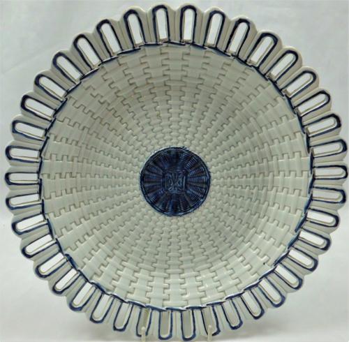 A large pearlware plate with basket weave decoration, English circa 1800