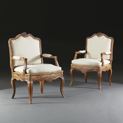 Early 19th Century French Walnut Open Armchairs