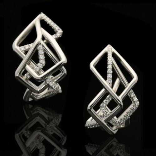 sculptural asymmetric platinum and diamond Disorient hoop earrings