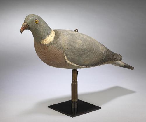 A Rare Documentary Working Wood Pigeon Decoy In Feeding Posture with Rocking Mechanism Various Media Clad in Hand Painted Canvas English, Lake District, c.1930 Stamped "DF" for Daniel Foster, Maker, and Former Gamekeeper at Cockermouth Castle.