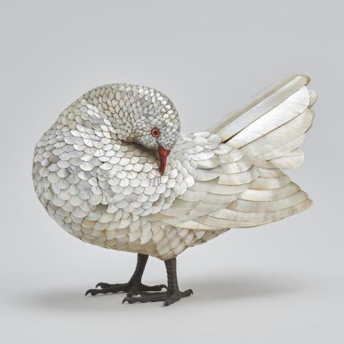 A beautiful antique Japanese mother of pearl okimono of a preening white dove