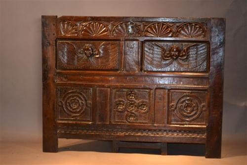 A mid 16th century oak chest front
