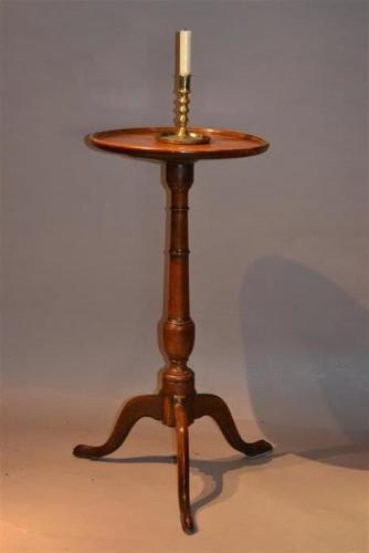 An elegant Georgian fruitwood candle stand
