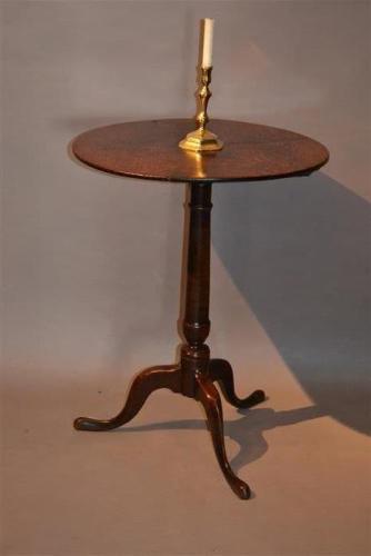 An elegant George III oak pedestal table