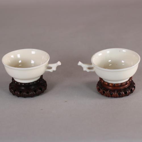 pair of bamboo handle blanc de chine cups