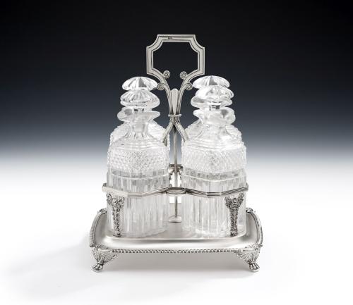 A very fine George III Four Bottle Decanter Cruet made in London in 1823 by William Bateman I