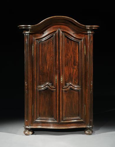 Exceptional Diminutive Bonnet Top Armoire With Serpentine Front and Moulded Twin Panelled Doors  Sold Well Figured and Richly Patinated Chestnut French, Provincial, c.1760