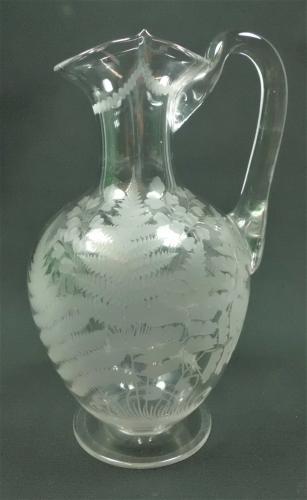 A crystal glass wine jug very well engraved with ferns, English circa 1880