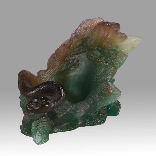 Pate de verre scultpture entitled "Serpent Vide Poche" by Daum Glass