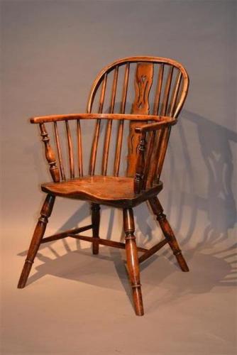 An unusual George III Windsor armchair