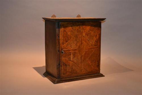 A late 17th parquetry century wall cupboard