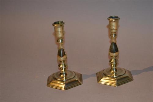 Early 18th century brass candlesticks