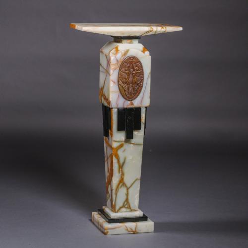 An 'Art Deco' Patinated Bronze, Onyx and Polished Slate Pedestal By Demétre Chiparus
