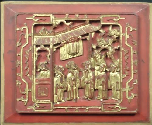 gilded wood panel carved with a Chinese scene