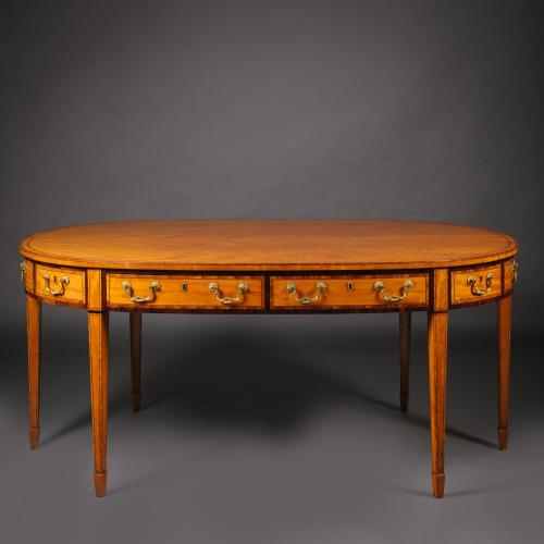 A Late Victorian Satinwood Library Table or Desk, In the Style of Thomas Sheraton