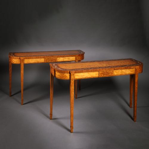A Pair of George III Polychrome-Decorated Satinwood Console Tables. England, Circa 1800.
