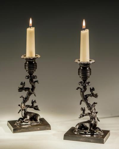 A Fine Pair of Gilt Bronzed Stag and Doe Candlesticks