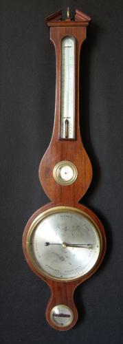 Thomas Rubergall - London. Good quality and unusual early 19th Century mahogany Wheel Barometer. c1815