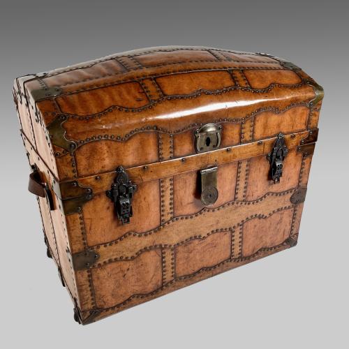 Leather domed travelling trunk