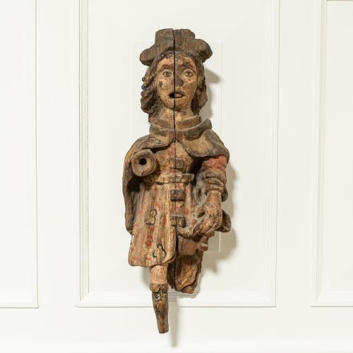A 16th century carved figure
